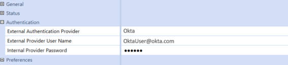 The System Security user configuration page has a grid with row headings that have a blue background with blue text and can be expanded to display fields with a white background and black text. Under the Authentication row heading, the External Authentication Provider field has Okta selected, and the External Provider User Name field has an Okta email address.