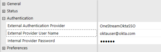 The System Security user configuration page has a grid with row headings that have a gray background with black text and can be expanded to display fields with a white background and black text. Under the Authentication row heading, the External Authentication Provider field has an Okta identity provider selected, and the External Provider User Name field has an Okta email address.