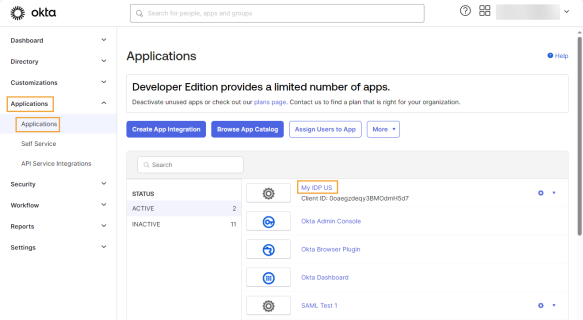 The Okta Applications screen has a navigation pane on the left and a row of buttons to select at the top of the screen. This example highlights the Applications menu and Applications selection in the navigation pane. It also highlights the identity provider that was just created, which is listed on the screen with blue text that is a link that can be selected.