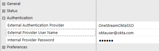 The System Security user configuration page has a grid with row headings that have a gray background with black text and can be expanded to display fields with a white background and black text. Under the Authentication row heading, the External Authentication Provider field has Okta identity provider selected, and the External Provider User Name field has an Okta email address.